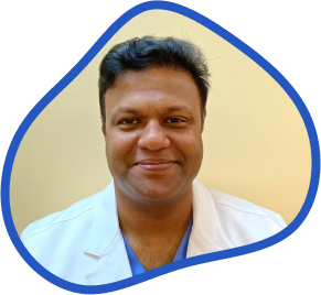 Dr. Monir Mohar with blue background